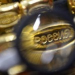 Золото дешевеет после продолжительного роста