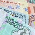 Средневзвешенный курс доллара на ЕТС вырос до 69,66 рубля